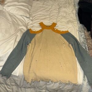 Women’s distressed fall sweater